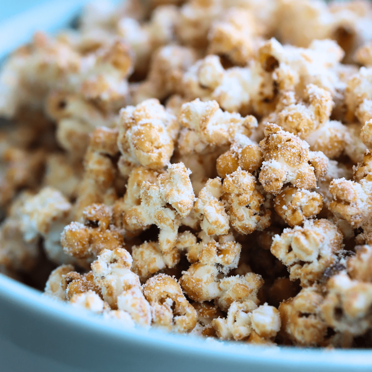 photo of homemade kettle corn in a green bowl