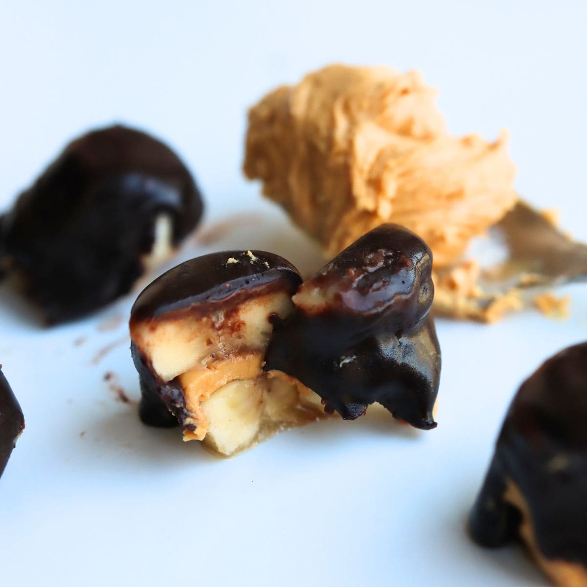 frozen peanut butter banana bites on a white background